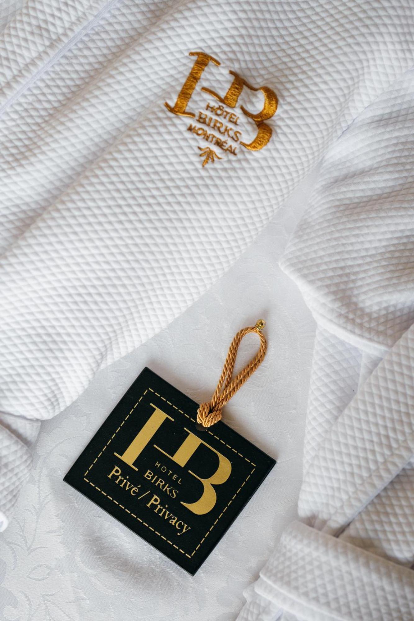 Hotel Birks مونتريال المظهر الخارجي الصورة A gold-plated bookmark