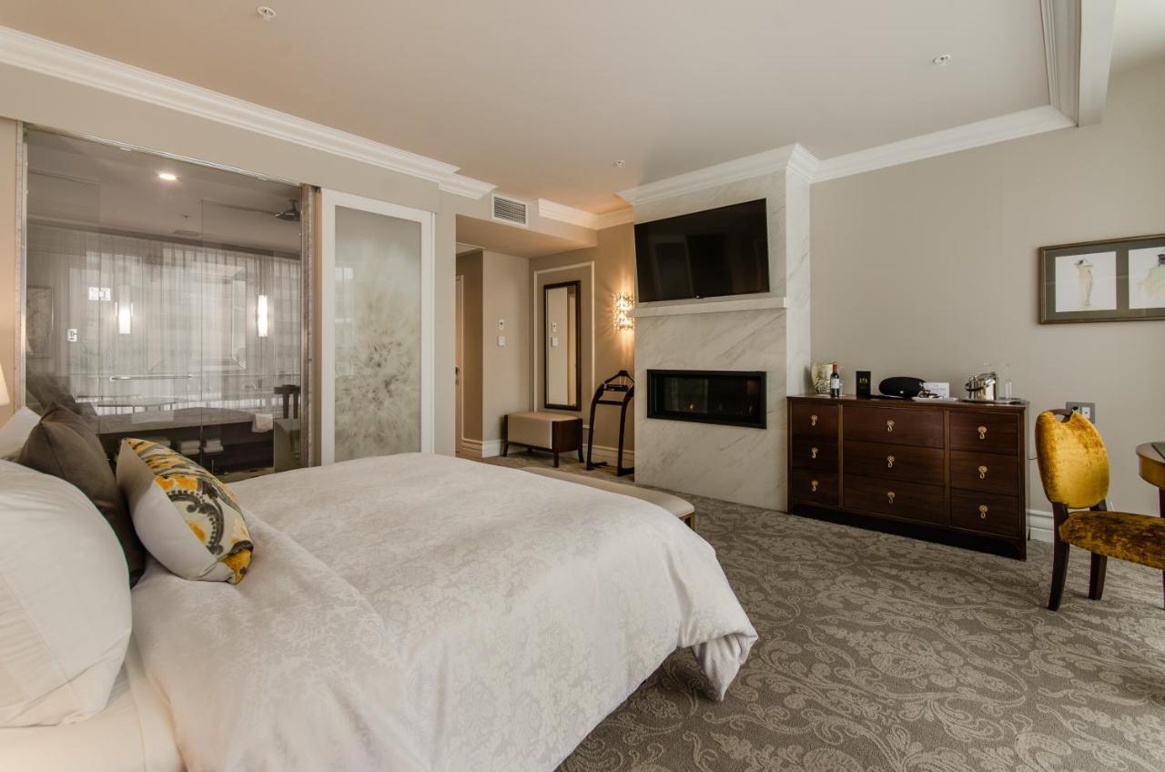 Hotel Birks مونتريال المظهر الخارجي الصورة A bedroom at the Hotel